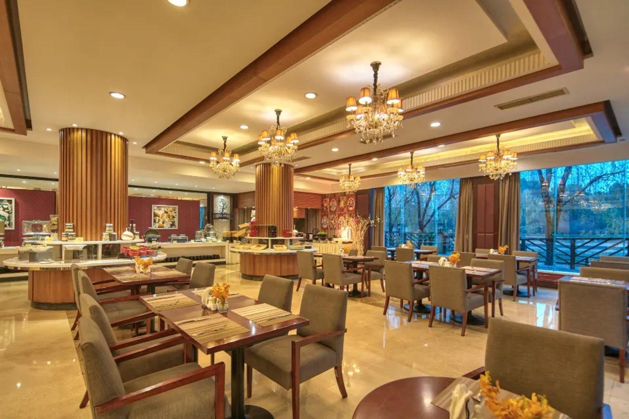 Shanghai New Century Manju Hotel Luoshan @Sniec מראה חיצוני תמונה