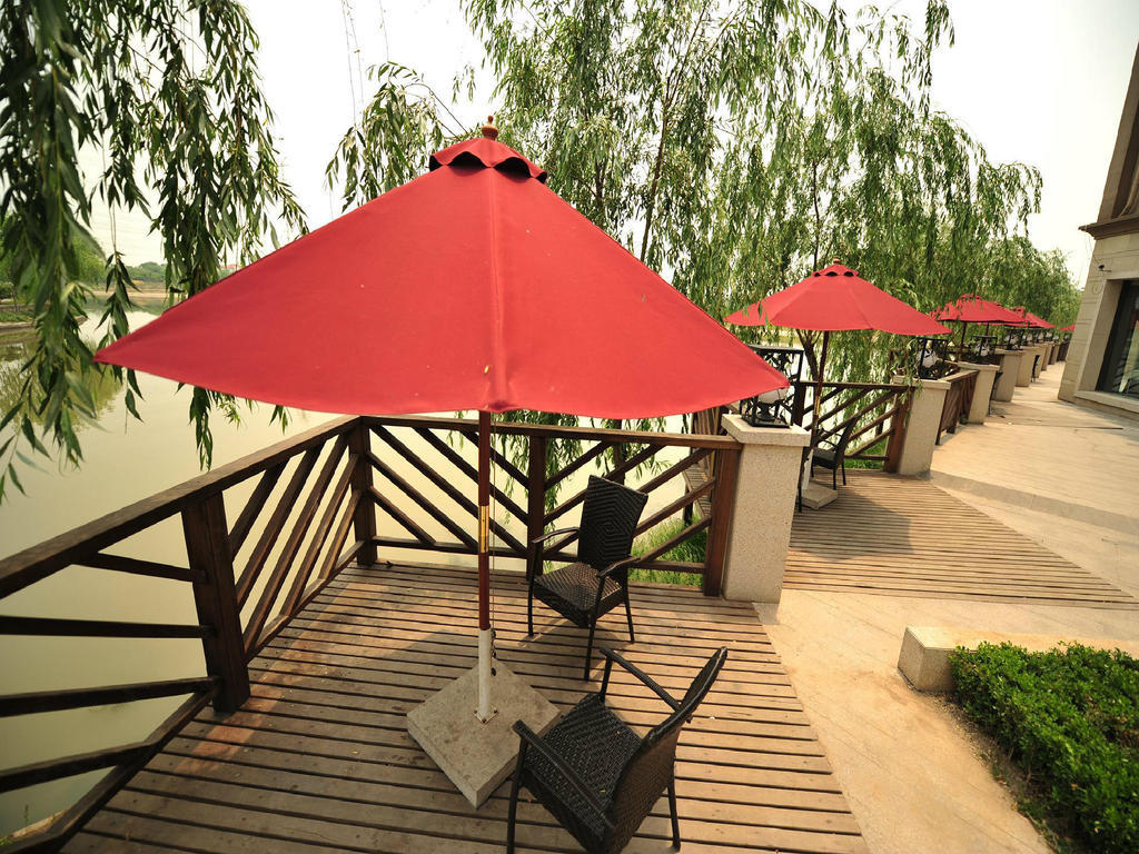 Shanghai New Century Manju Hotel Luoshan @Sniec מראה חיצוני תמונה